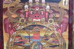 
The Tibetan Wheel of Life is perhaps the most common of all pictures in Buddhist art and is seen on the walls of monasteries and painted scrolls all over Tibet, Nepal and other Himalayan countries. The 23 parts of the painting represent in visual terms some of the more fundamental teachings in Buddhism such as the 12 steps of dependent origination, the karmic laws of cause and effect, and the three kleshas of ignorance, greed and hatred.
